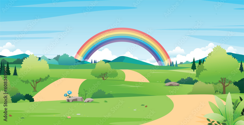 Green fields with mountains with rainbow in the background.