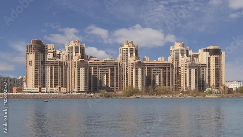 City Buildings, clouds and river photo