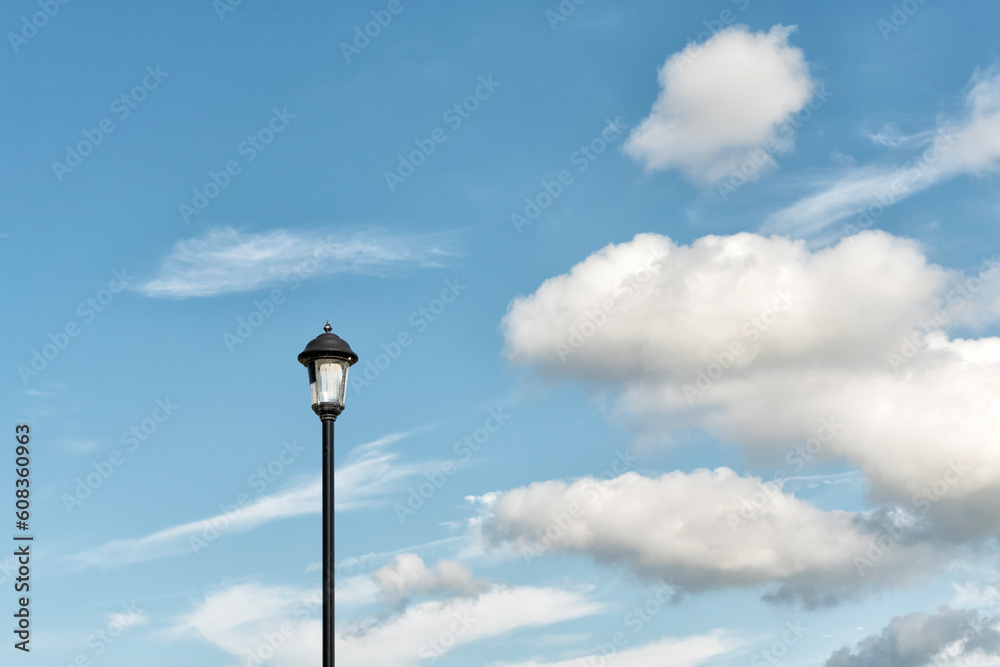 Vintage lamp post against sky