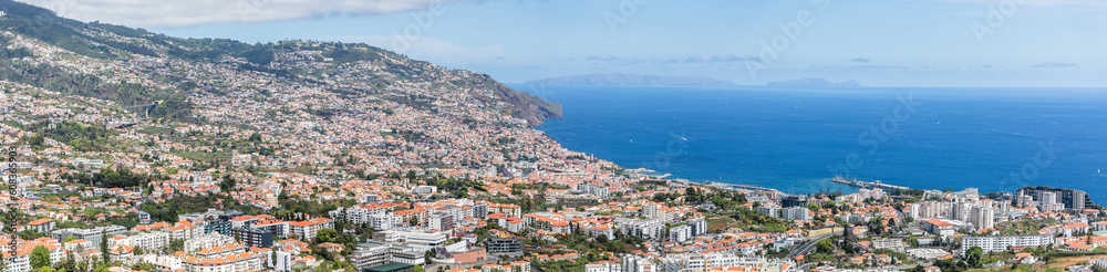 Full panoramic aerial view of the city of Funchal and Camara de Lobos, tourist and iconic city on the island of Madeira, in Portugal