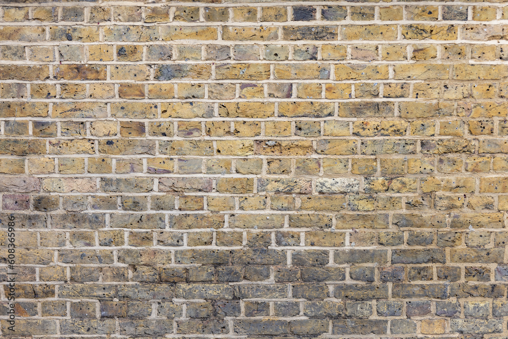 Naklejka premium Old weathered brick wall texture. Grunge urban street brick wall