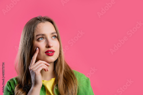 Thinking around woman on pink background. Puzzled lady looking for answer.