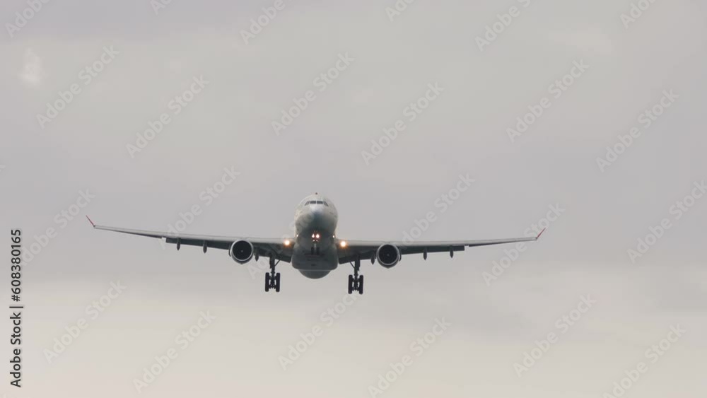 Passenger airplane flies overhead. Jet plane in the sky. Flight departure. Tourism and travel concept Passenger airplane flies overhead. Jet plane in the sky. Flight departure. Tourism and travel concept