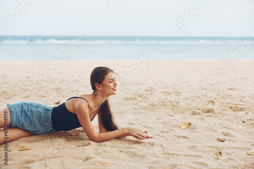 woman sea sitting nature beach model sand freedom travel smile vacation