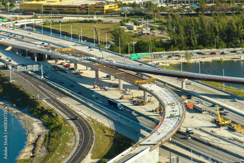 Industrial roadworks in Miami, Florida. Wide american highway junction under construction. Development of interstate transportation system for rapid transit for long distance travelling