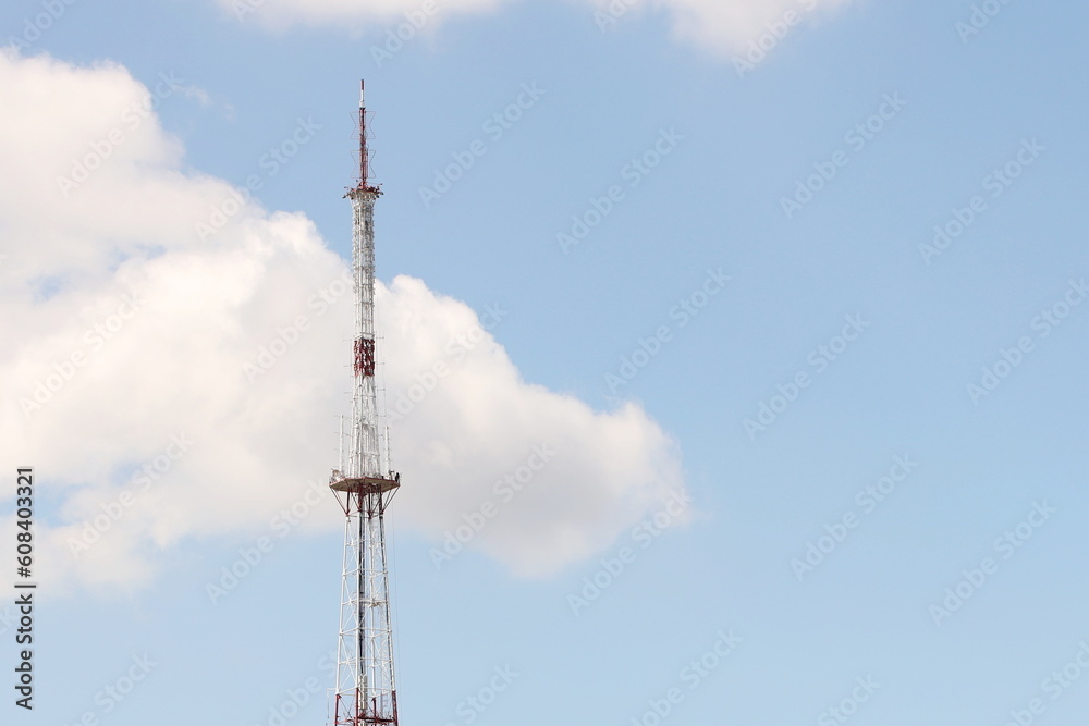Television and radio tower in Ukraine in the city of Lviv. Technological frame structure made of metal. High radio technologies. Transmission of a radio signal over a distance by wireless communicatio Television and radio tower in Ukraine in the city of Lviv. Technological frame structure made of metal. High radio technologies. Transmission of a radio signal over a distance by wireless communicatio
