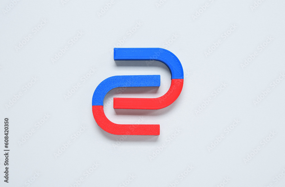 Horseshoe shaped magnets on white background Horseshoe shaped magnets on white background