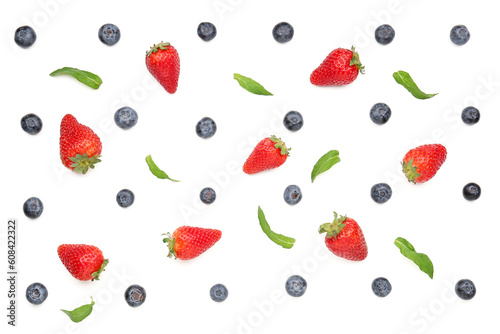 Ripe strawberry, blueberry and leaves on white background