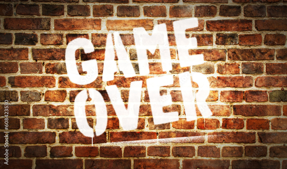 Game over symbol spray painted on the brick wall Game over symbol spray painted on the brick wall