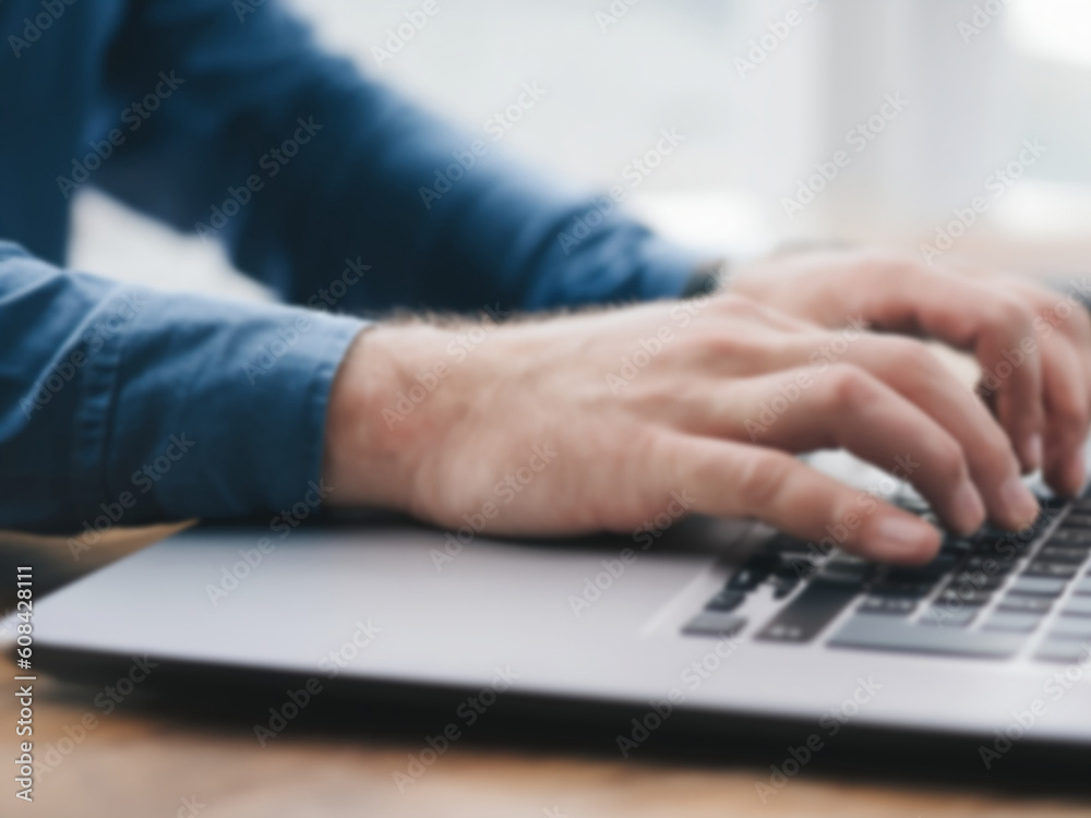 close up of a person typing on a laptop - working from home close up of a person typing on a laptop - working from home