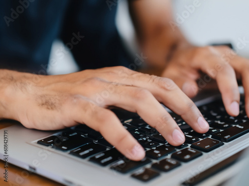 Person Working, Close Up of Hands typing on a Laptop
