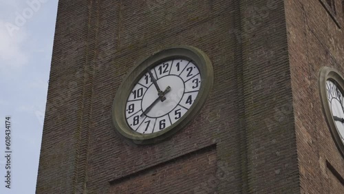 Antique clocks on the brick tower