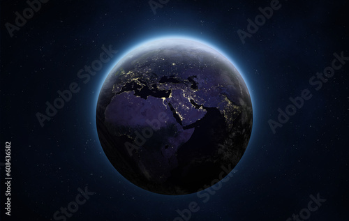 Planet Earth at night. Europe, Africa and Asia at night viewed from space with city lights. Human activity in Germany, France, Spain and other countries. Elements of this image furnished by NASA. © revers_jr
