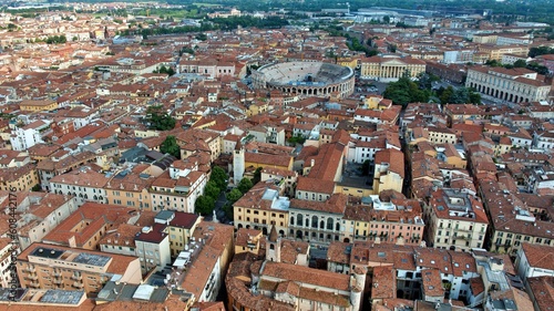 Panoramic aerial view of Verona at sunset with the Verona Arena in the center. Veneto, Italy