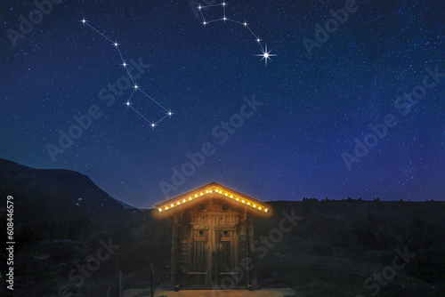 Obraz na płótnie A real night scene on a mountain hut with starry sky showing constellation of big dippper and little dipper and the North Star w salonie
