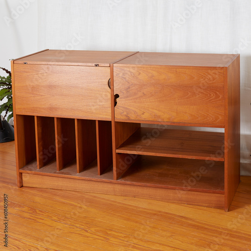 Vintage teak media console. Mid-Century Modern record storage cabinet.