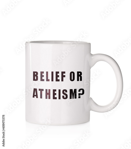 Cup with phrase Belief Or Atheism? on white background