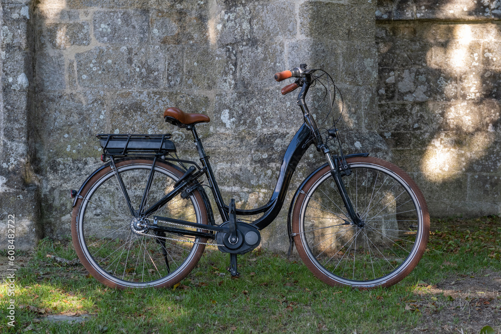 Retro bicycle by and old church