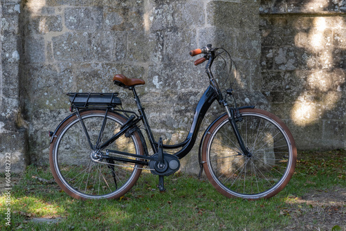 Retro bicycle by and old ch...