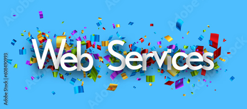 Web services sign over cut out colorful confetti backgaround.