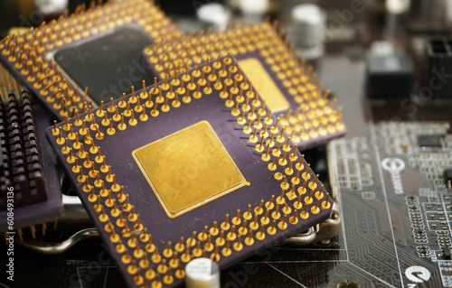 Bild auf Leinwand Close up old cpu microprocessor obsolete computer With gold as ingredient and motherboards
