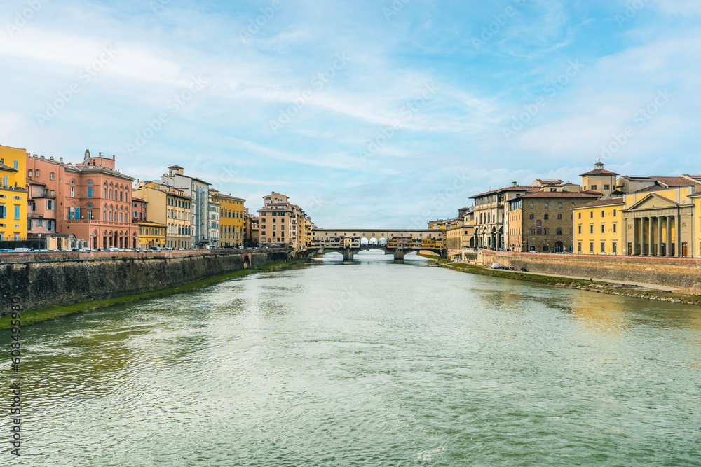 Landscape of Arno River and Ponte Vecchio, in Florence, Italy. Far away, Ponte Vecchio