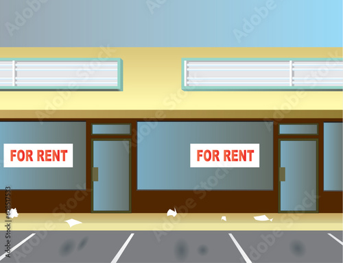 Two vacant storefronts in a typical strip mall.