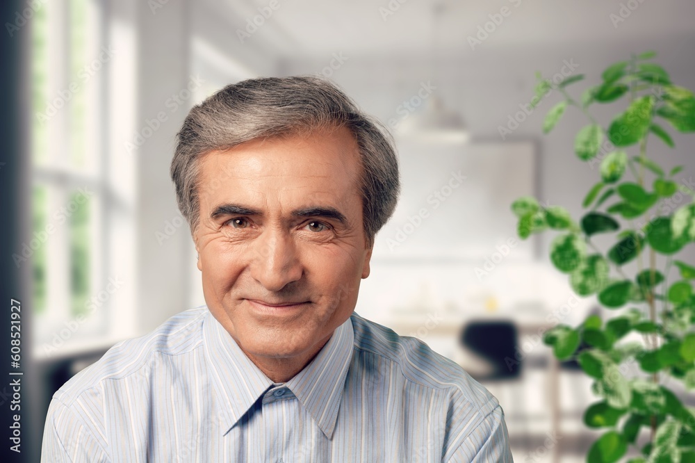 Fototapeta premium Relax, happy elderly man posing in home