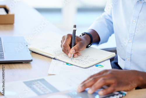 Accountant, closeup and black man with a calculator, writing and notebook with a budget, documents or planning. Male person, investor or employee with paperwork, research or check list in a workplace