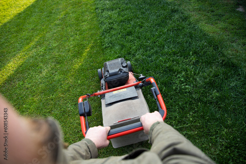 Lawn mover on green grass. Machine for cutting lawns.