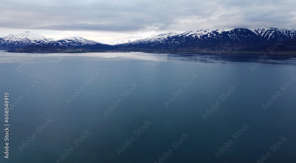 Aerial view of the beautiful North polar background. Landscape nature sea and mountains of Iceland. Photography for tourism background, design and advertising
