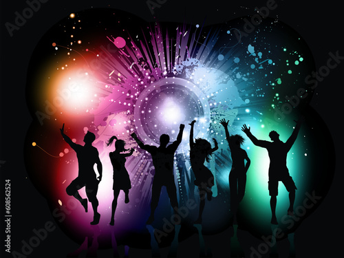 Silhouettes of people dancing on a colourful grunge background