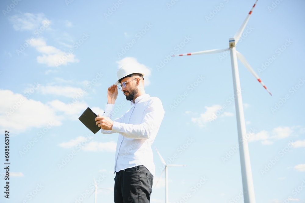 Power engineer are working with wind turbines.
