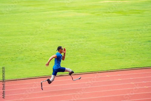 Asian para-athletes disabled with prosthetic blades running at stadium