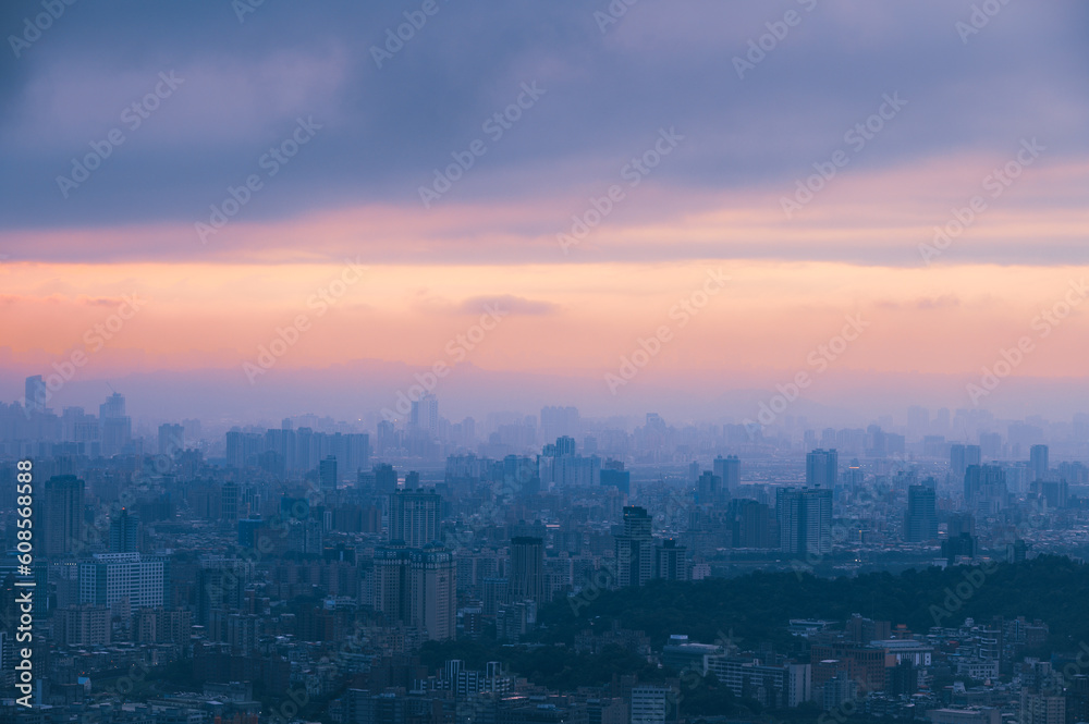 Sensual city sunsets: breathtaking cityscapes with changing skies and light. Spectacular Evening Views of Taipei: Dynamic Clouds and Cityscape.