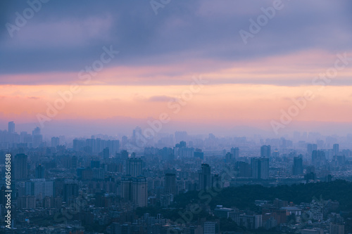 Sensual city sunsets: breathtaking cityscapes with changing skies and light. Spectacular Evening Views of Taipei: Dynamic Clouds and Cityscape. © twabian