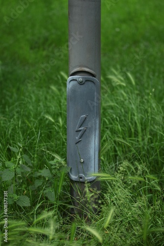 A metal pole with a current rating photo