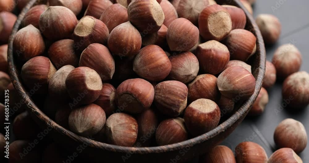 Whole hazelnuts close-up on rotating platform Whole hazelnuts close-up on rotating platform