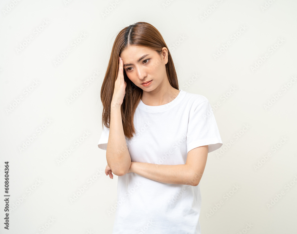 Young asian beautiful woman hand touching head she's feeling depressed stress headache be tired from working standing on isolated white background she has symptom office syndrome. Young asian beautiful woman hand touching head she's feeling depressed stress headache be tired from working standing on isolated white background she has symptom office syndrome.
