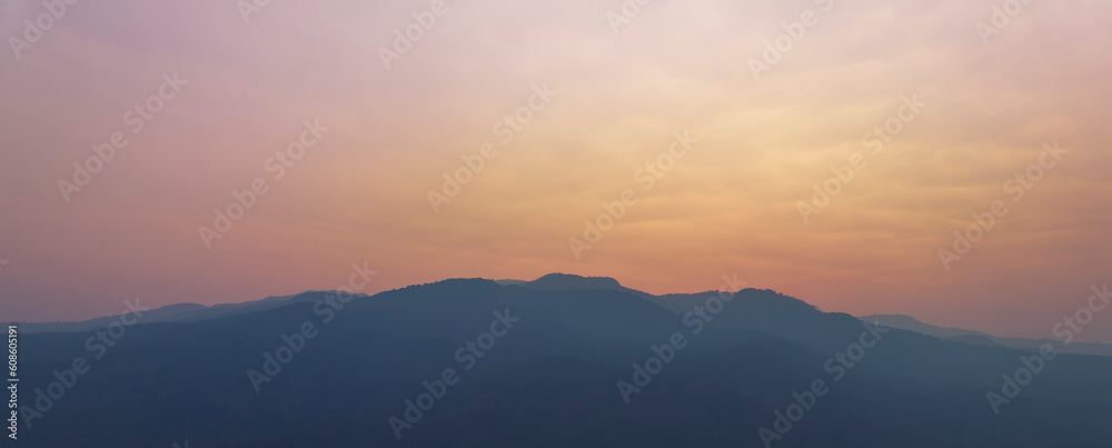 Aerial view of forest at sunrise. Drone shot flying over treetops, autumn forest , Flight over woods, nature background	
