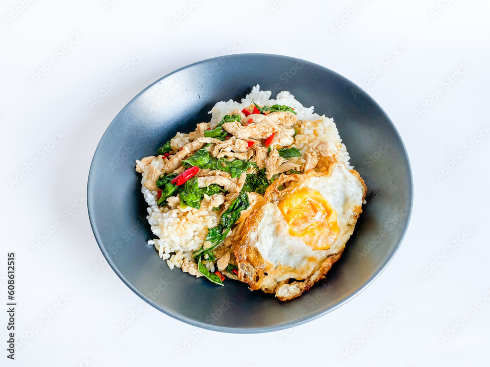 Rice topped with chicken with Thai basil and fried egg Rice topped with chicken with Thai basil and fried egg