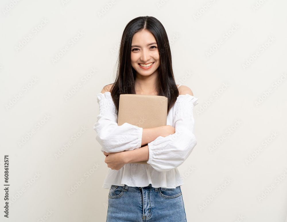 Young excited beautiful asian woman with parcel cardboard standing on isolated background. Cheerful female holding lot of parcel box receive from the delivery service shopping online application Young excited beautiful asian woman with parcel cardboard standing on isolated background. Cheerful female holding lot of parcel box receive from the delivery service shopping online application