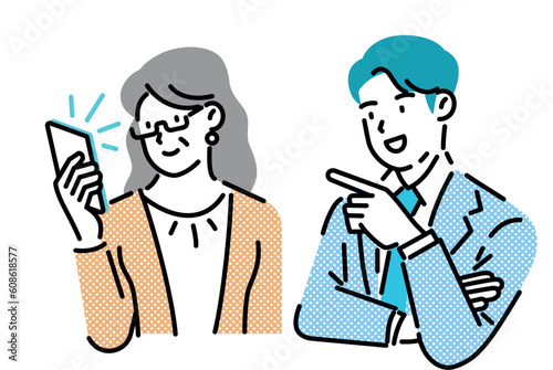 A middle-aged woman and a young man checking their smartphones