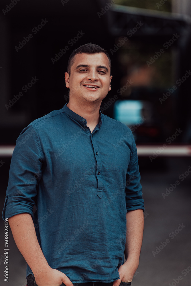 A portrait of a modern man, exuding confidence and style, against an outdoor backdrop, showcasing his charisma and fashionable demeanor. A portrait of a modern man, exuding confidence and style, against an outdoor backdrop, showcasing his charisma and fashionable demeanor.