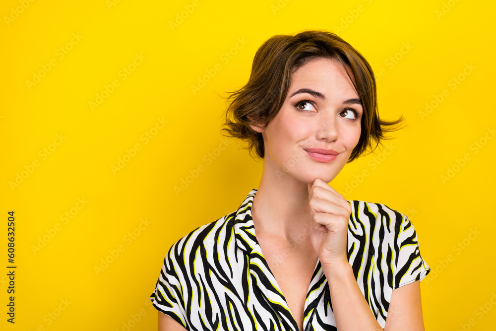 Portrait of adorable cute lady touch her chin intelligent worker look empty space wear zebra blouse isolated yellow color background Portrait of adorable cute lady touch her chin intelligent worker look empty space wear zebra blouse isolated yellow color background