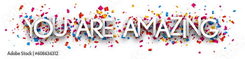 You are amazing sign on colorful cut ribbon confetti background.