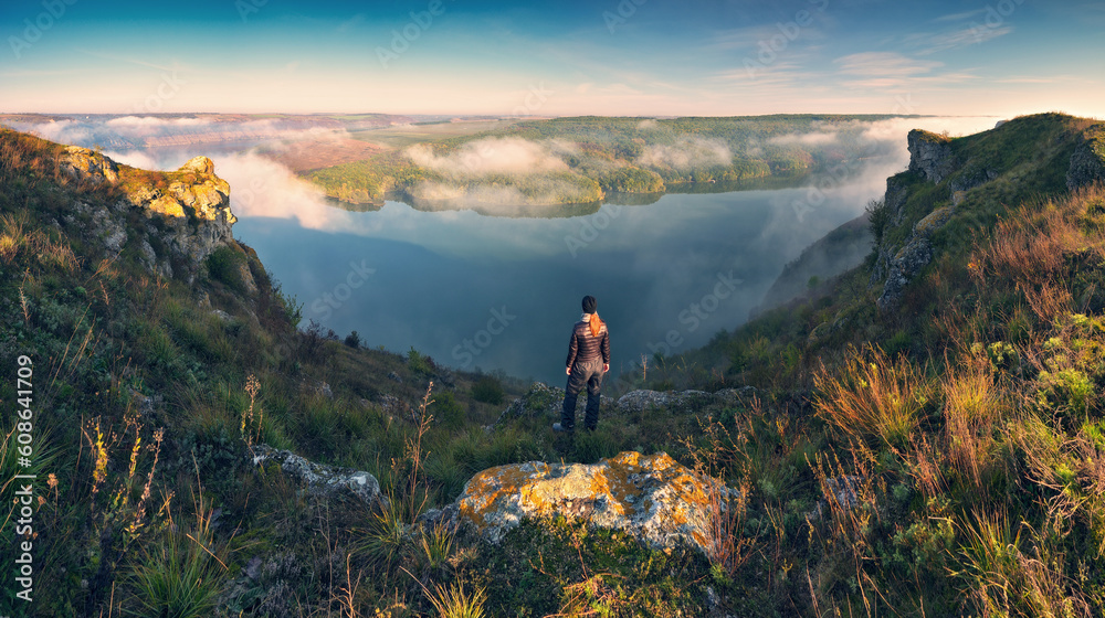 woman enjoying the beauty of nature in a picturesque canyon. Landscape of Ukraine
