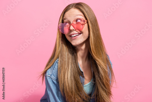 Photo of cheerful dreamy lovely lady wear stylish clothes sunglass looking up empty space seasonal sale isolated on pink color background