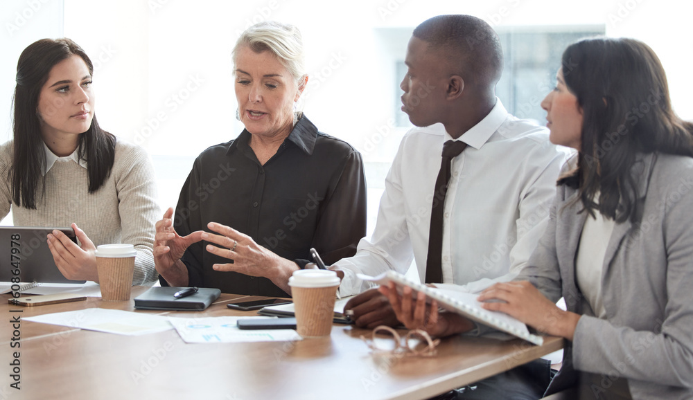 Business people, meeting and manager talking to a team in a corporate office for brainstorming. Diversity men and women at a table for planning, discussion and strategy for growth and development Business people, meeting and manager talking to a team in a corporate office for brainstorming. Diversity men and women at a table for planning, discussion and strategy for growth and development