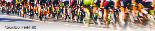 Captivating close-up of a bike peloton racing at full speed, showcasing wheels with striking motion blur trail effect. Experience emotion and thrill in this image! Generative AI